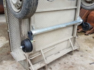 AXLES FOR TRAILER CARS
